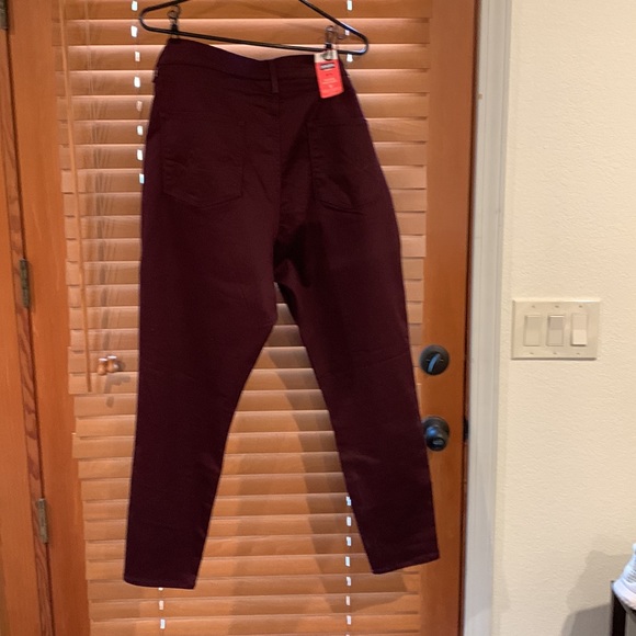 Plus size High-rise ankle skinny stretch jeans in wine color. - Picture 2 of 3